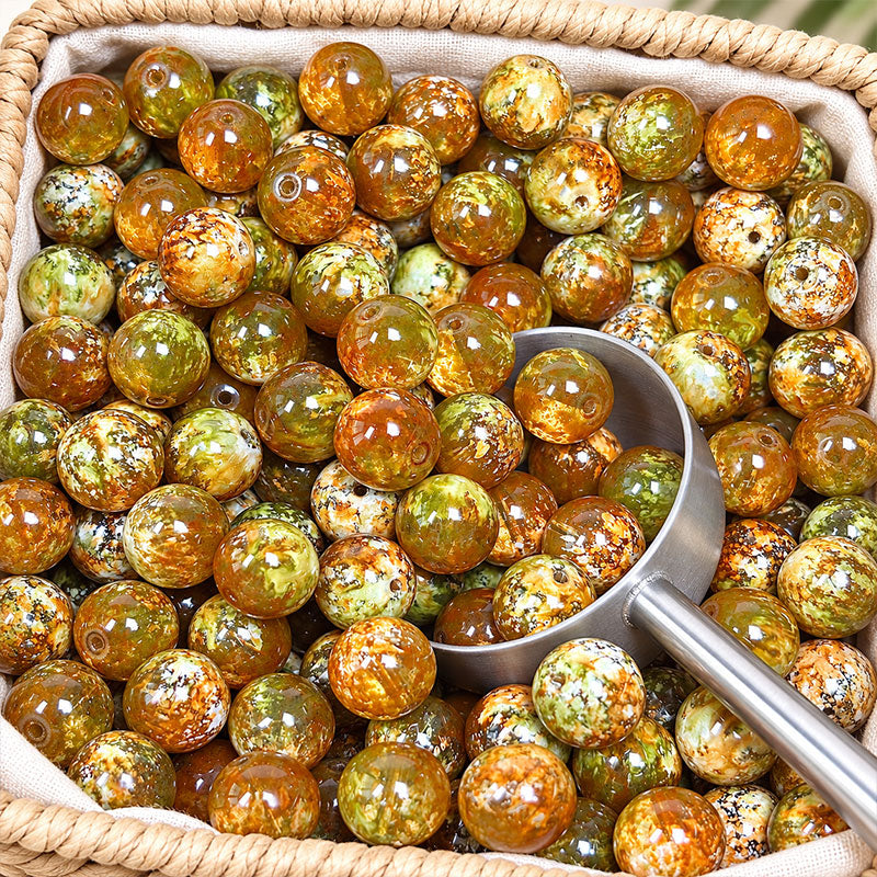 16mm amber and olive snowflake glass round beads with glossy marbled finish