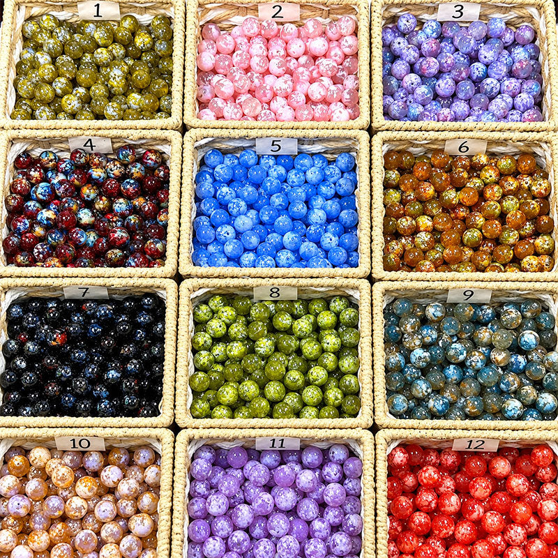 Colorful 16mm snowflake glass round beads in multiple marbled shades for DIY jewelry