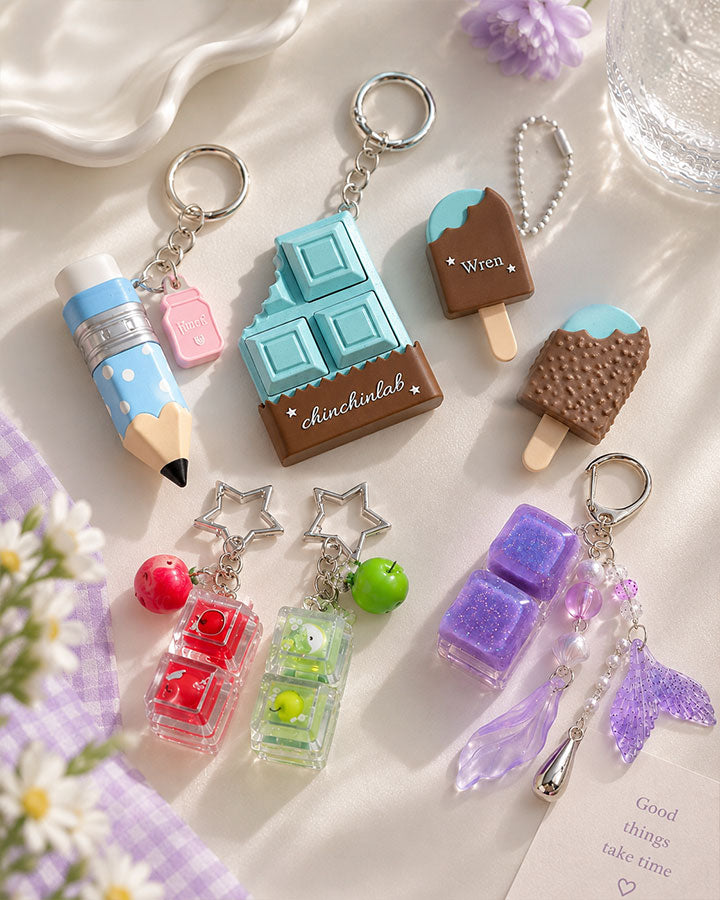 Handmade Lucky Click charms with colorful clicky keychains and decorative bag charms